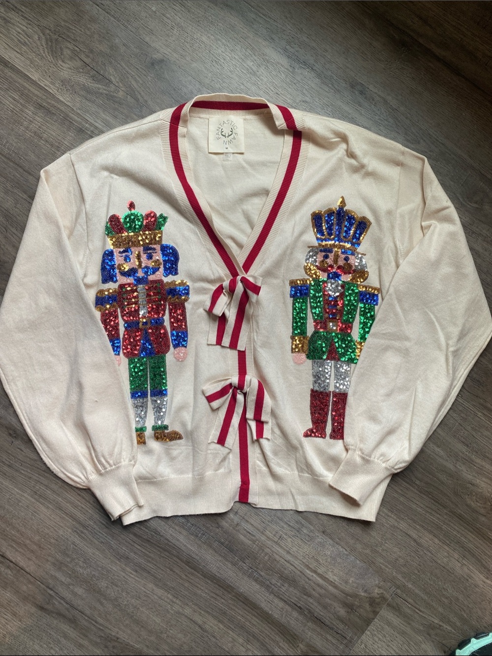 Fantastic Fawn Cream Sequin Nutcracker Tie-Front Cardigan with Red Trim